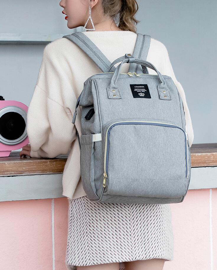 Waterproof Diaper Bag Backpack with USB Charging Port | Large Capacity Travel Nursing Bag for Moms & Dads